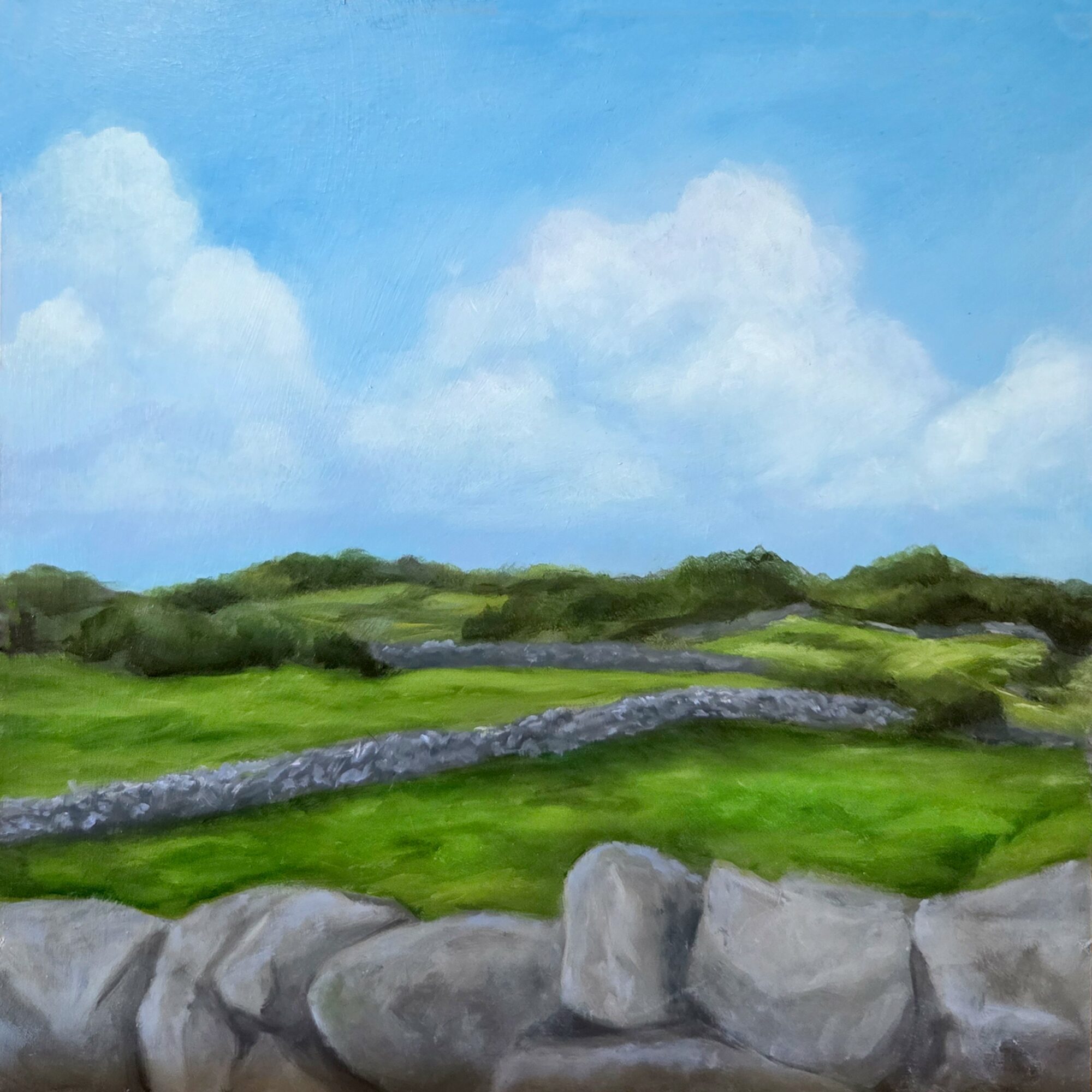 Landscape painting of green fields, stone wall, blue sky with clouds, and distant hills.