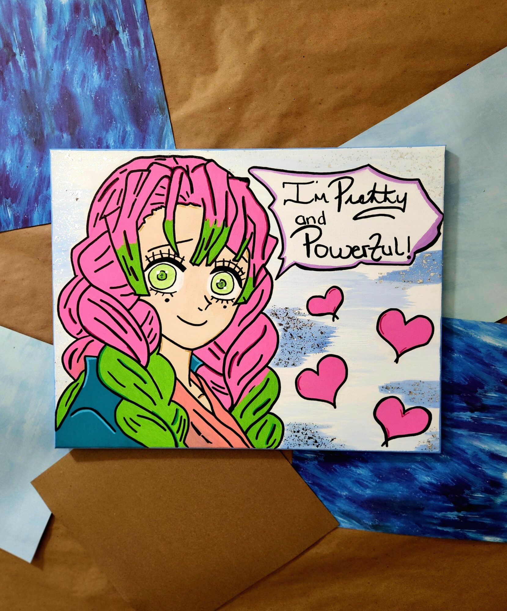 Colorful drawing of a girl with pink and green hair, smiling, with speech bubble and pink hearts, on a white background.