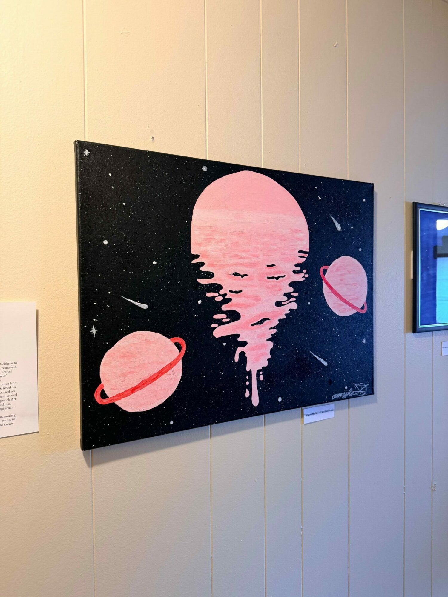 Painting of planets and a comet against a starry black background, with pink and red hues.