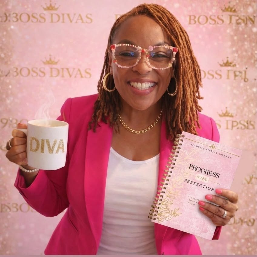 Smiling woman with glasses holding a mug and a notebook, standing in front of a pink background with gold text.